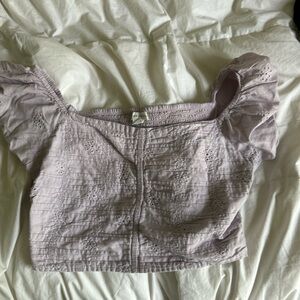 Purple milkmaid top with a cute flower design